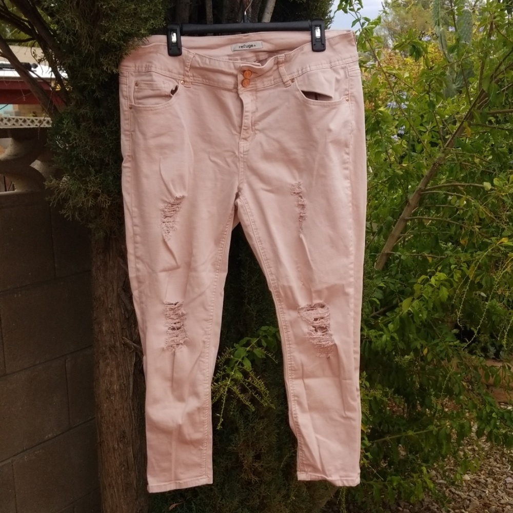 Light pink distressed skinny jeans